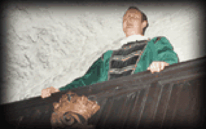 The Emcee announces eniemies of his lord approach the gate