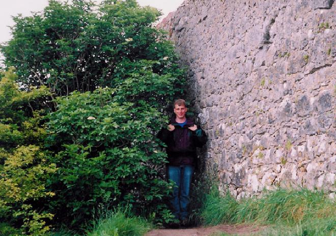 Image of the author by the castle wall